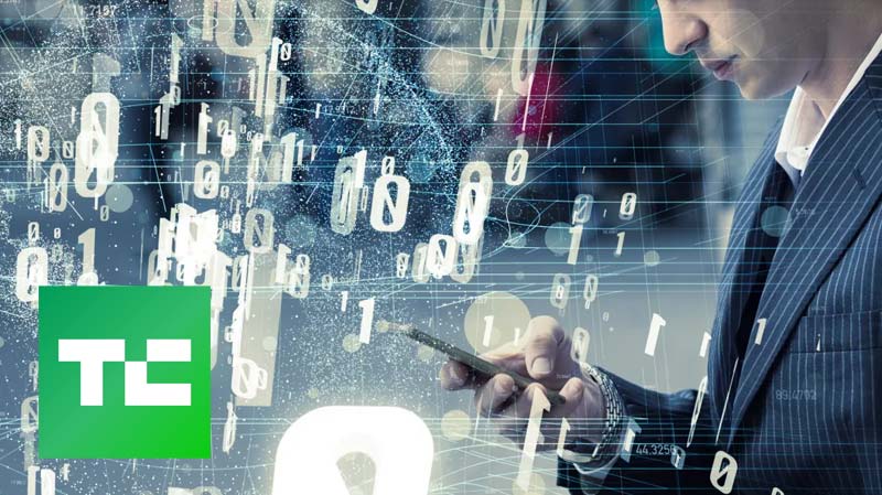 TechCrunch illustration of a businessman checking his phone amid a digital data overlay